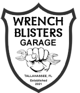 Wrench Blisters Logo with a fist holding a wrench.