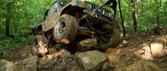 Offroad Jeep crawling on a mountain trail