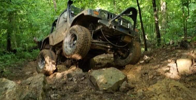 Offroad Jeep crawling on a mountain trail