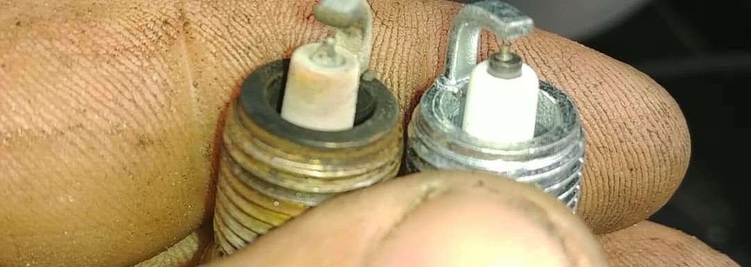 comparing two spark plugs