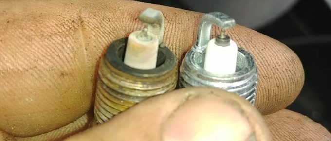 comparing two spark plugs