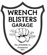 Wrench Blisters Logo with a fist holding a wrench.